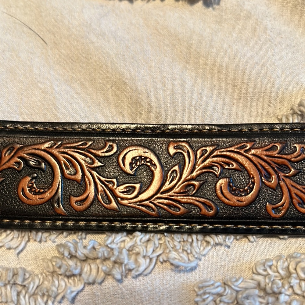 Men’s size 32 black/brown western scrolled belt with removable buckle. USA made.